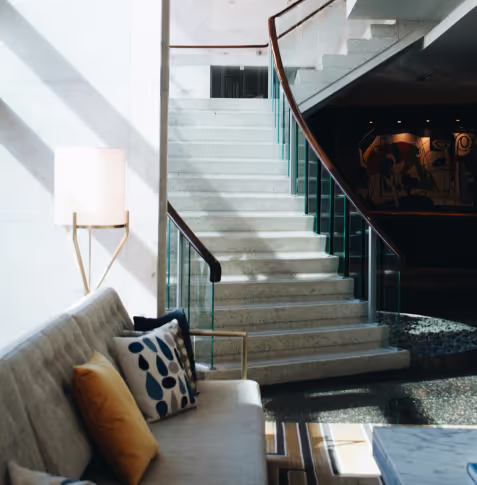 A staircase at a cozy hotel lobby
